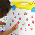 thumb print strawberry art for toddlers