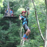 Kids ziplining at Virginia Canopy Tours in Shenandoah River State Park